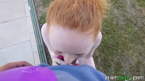 Redhead Teen Ruby Red Blowing by The Pool