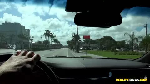Young Girl Shows Her Charms In The Car